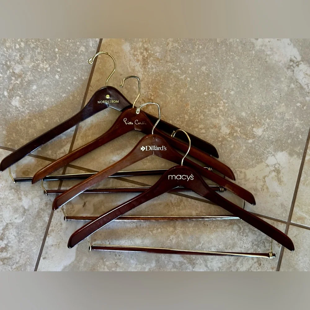 4 Designer/Department Store Wooden Slack Hangers. Dark wood w/gold hanger.